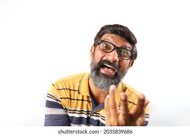 Portrait Of An Indian Bearded Happy And Excited Man Wearing Shirt Excited Face Closeup. Funky Expressions White Background.