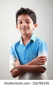 Portrait Of An Indian Boy With Hands Tied Together