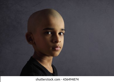 Portrait Of Indian Boy With Shaved Head