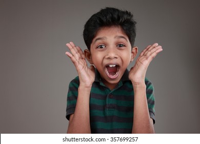 Portrait of an Indian boy shouting loud