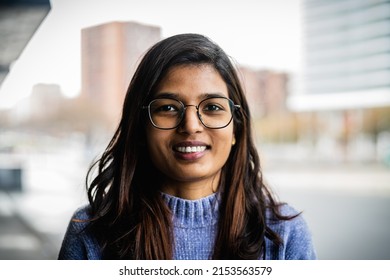 Portrait Of Indian Girl Smiling In Camera