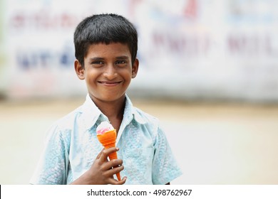 Portrait of Indian Little Boy with Ice Cream