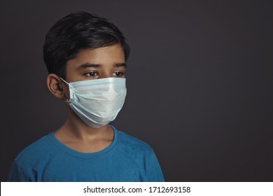  Portrait Of Indian Little Boy Wearing Protective Mask Against The Coronavirus