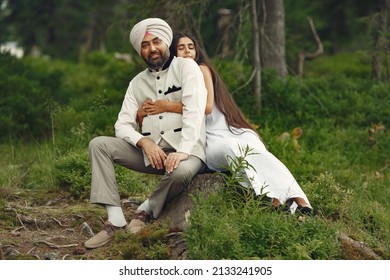 Portrait of Indian sikh man in turban with daughter