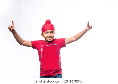 Portrait of Indian Sikh/punjabi little boy with multiple expressions. isolated over white background
