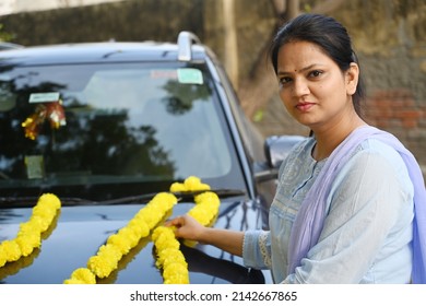 Portrait Of An Indian Young Woman With A New Car.