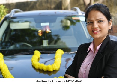 Portrait Of An Indian Young Woman With A New Car.