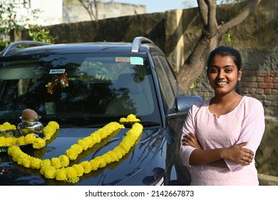 Portrait Of An Indian Young Woman With A New Car.