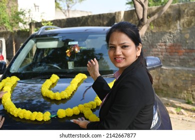 Portrait Of An Indian Young Woman With A New Car.