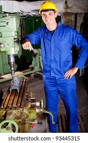 Portrait Of Industrial Machinist Inside Workshop