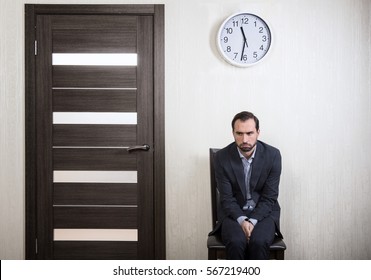 Portrait Of An Insecure Man Waiting For A Job Interview