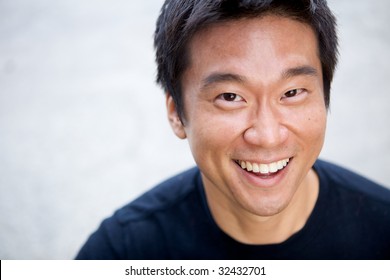 Portrait Of An Interesting Asian Man With An Honest Face