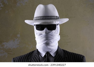 portrait of an invisible man with a bandaged head
