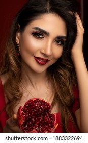 Portrait Of Iranian Beautiful Girl With Pomegranate - Iranian Traditional Yalda Night