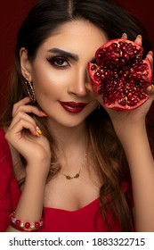 Portrait Of Iranian Beautiful Girl With Pomegranate - Iranian Traditional Yalda Night