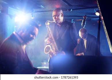Portrait of Jazz Band playing on Stage
