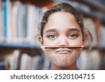 Portrait, joke and girl student with pencil at school library on break for education or learning. Funny learner, goofy or silly kid with mouth or eyes wide open for studying or playing in Australia