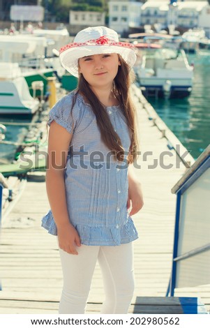 Similar – On the road in Venice. A girl stands on a bridge.