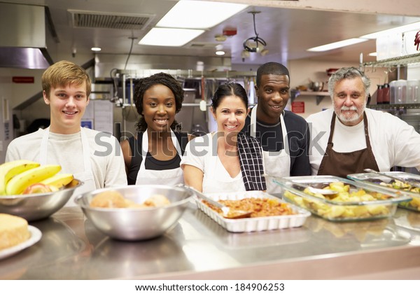 Portrait Of Kitchen\
Staff In Homeless\
Shelter