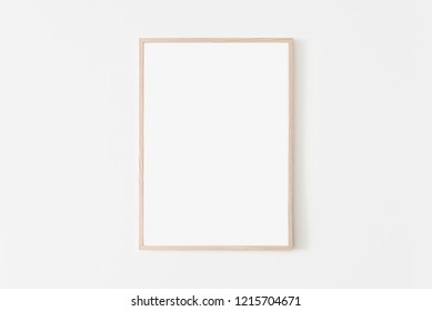 Portrait large 50x70  20x28  a3 a4  Wooden frame mockup white wall  Poster mockup  Clean  modern  minimal frame  Empty fra me Indoor interior  show text product