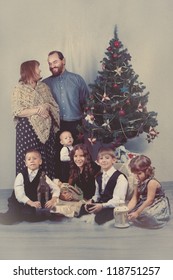 Portrait Of Large Family Near Christmas Tree