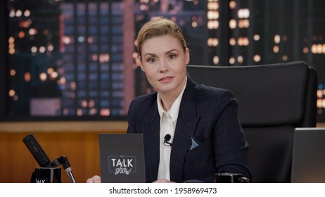 Portrait Of Late-night Talk Show Female Host Having A Conversation With Celebrity Guest In A Studio. TV Broadcast Style Show