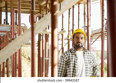 Portrait Of Latin American Construction Worker Looking At Camera