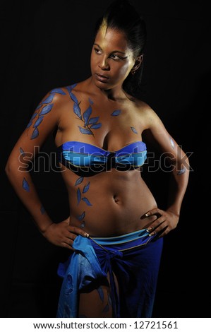 Portrait of latin bikini model posing isolated on black