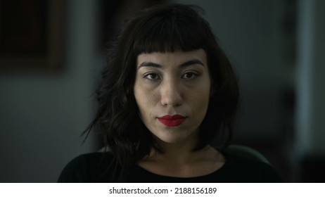 Portrait Of A Latin Hispanic Woman Closeup Face Looking At Camera With Serious Expression