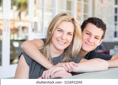 Portrait Of A Latin Mother And Teenage Son.