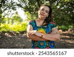 Portrait of a Latina woman in a rural setting wearing traditional dress