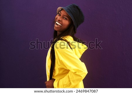 Similar – Image, Stock Photo Black woman in trendy attire wearing scarf isolated on yellow background