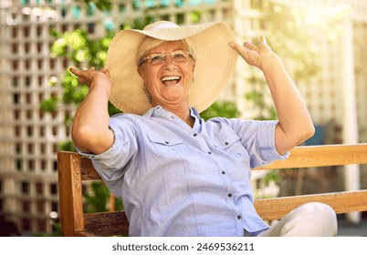 Portrait, laugh and senior woman with hat on bench, relaxation and glasses in garden. Joke, seat and elderly female person in backyard for happiness, comedy and funny with retirement in Canada - Powered by Shutterstock