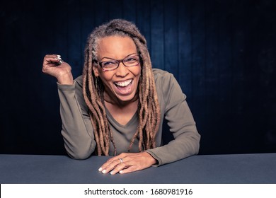 Portrait of a laughing African American Woman with dreadlocks - Powered by Shutterstock