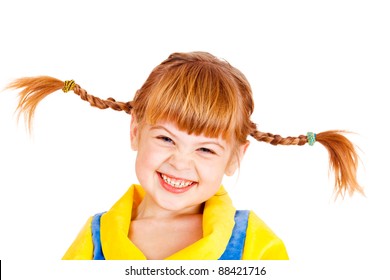 Portrait of a laughing girl with funny braids