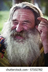 Portrait Of  Laughing Old Man With Gray Beard