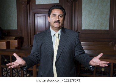 Portrait Of Lawyer Arguing During Case In Courthouse