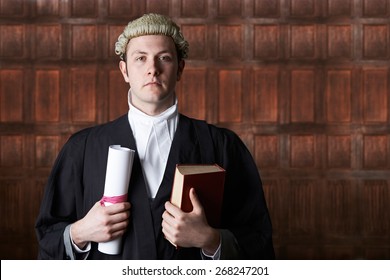 Portrait Of Lawyer In Court Holding Brief And Book