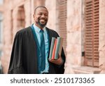 Portrait, lawyer or mature black man in city with books, smile or legislation for court case or legal justice. Happy, coworking or proud attorney in urban town with confidence in South Africa