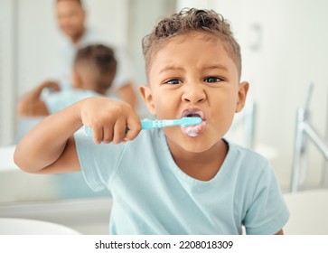 Portrait Of Learning Child Cleaning And Brushing Teeth In Home Bathroom For Dental Care, Tooth Care Or Oral Health. Morning Routine, Child Development And Life Skill Education For Kid With Toothbrush