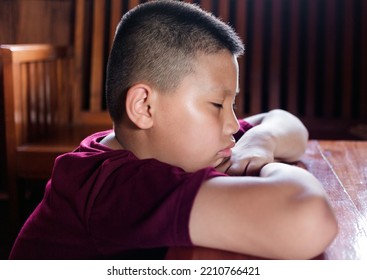 Portrait Of A Little Asian Boy, Kid Sad Face, Unhappy Child Looking Out, Emotion Sad And Sad Face, Depression Children Concept