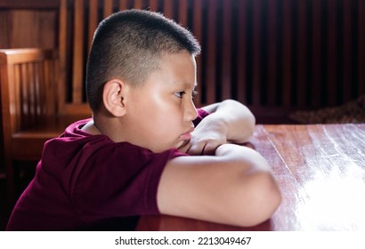 Portrait Of A Little Asian Boy, Kid Sad Face, Unhappy Child Looking Out, Emotion Sad And Sad Face, Depression Children Concept