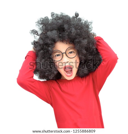 Portrait of little asian  girl angry acting with afro hair style. isolated on white background.
