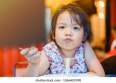 Portrait Of Little Asian Girl Child With No Appetite In Front Of The Meal.Concept Of Loss Of Appetite