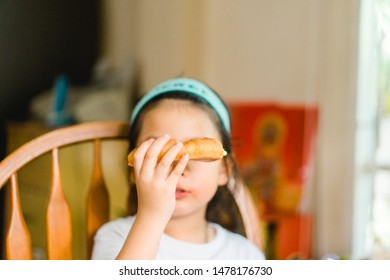 Portrait Of Little Asian Girl Child Hand Cover And Close Her Mouth And Face With No Appetite In Front Of The Meal.Concept Of Loss Of Appetite.