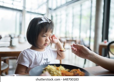 Portrait Of Little Asian Girl Child With No Appetite In Front Of The Meal.Concept Of Loss Of Appetite