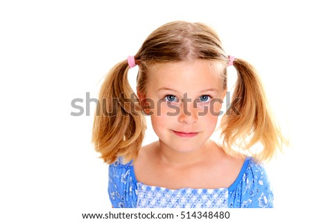 portrait of a little blond girl with pigtails