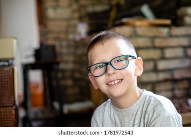Portrait of a Little boy with a eyeglasses smiling and looking at camera - Shutterstock ID 1781972543