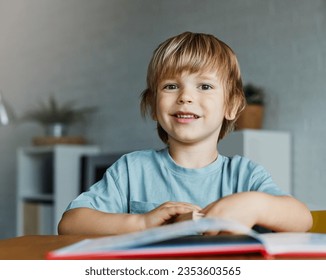 Portrait of a little boy at home