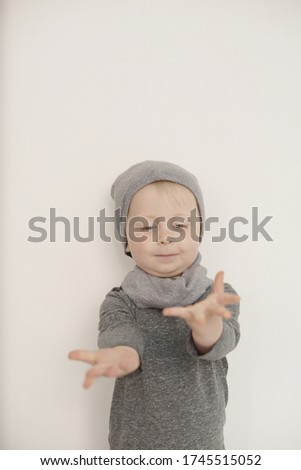 Similar – a little boy is offered a chocolate